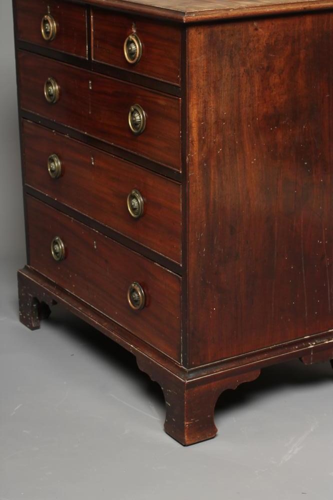 A MAHOGANY AND BANDED CHEST of two short and three long drawers Image