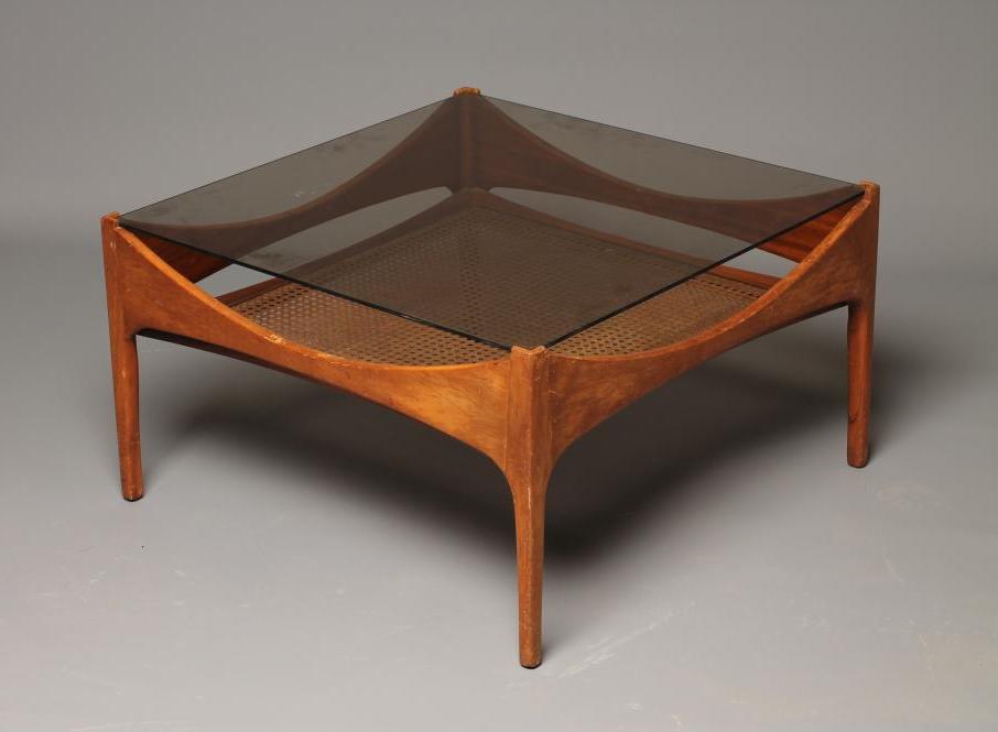 A RETRO "S" FORM TEAK COFFEE TABLE of square form with insert smoke glass top Image