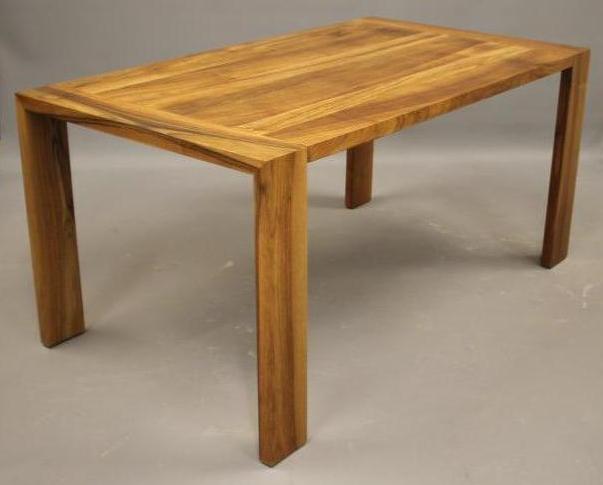 A WALNUT EXTENDING TABLE by Heals of London Image