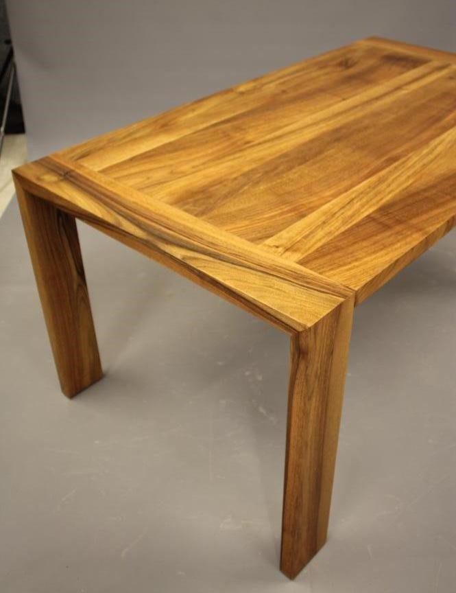 A WALNUT EXTENDING TABLE by Heals of London Image