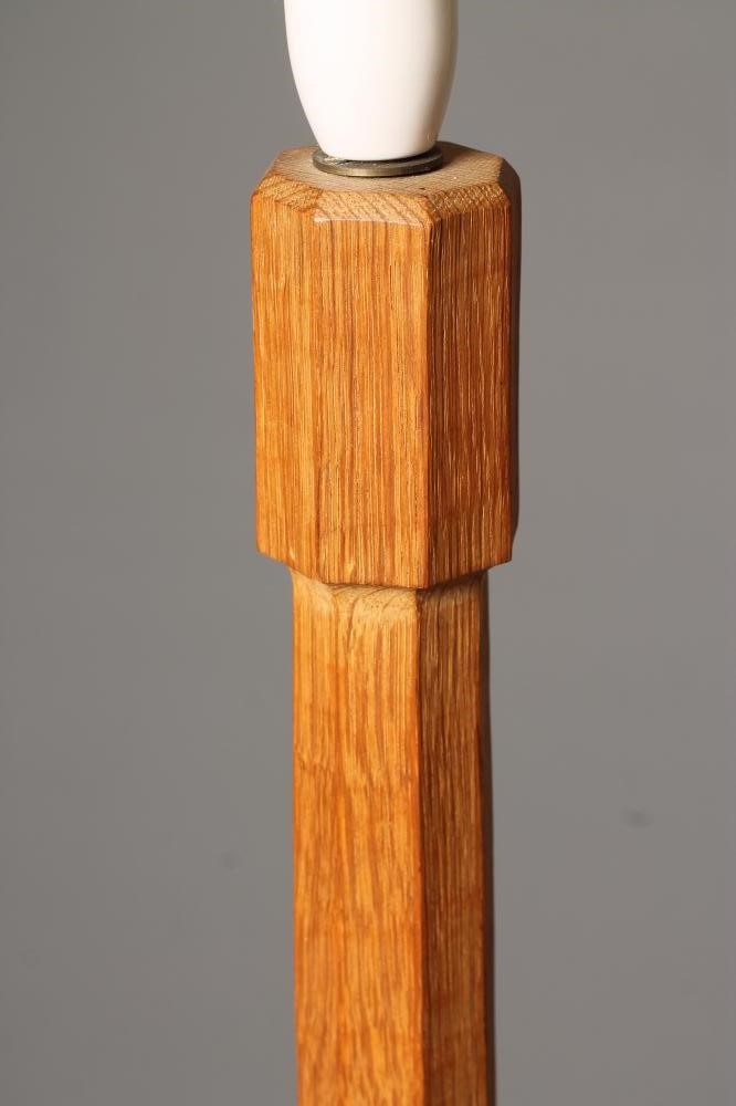 AN OAK STANDARD LAMP by Robert Thompson Image