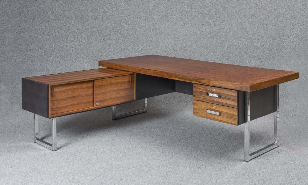 A GORDON RUSSELL ROSEWOOD VENEERED AND EBONISED VINYL DESK Image