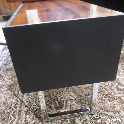 A GORDON RUSSELL ROSEWOOD VENEERED AND EBONISED VINYL DESK Image