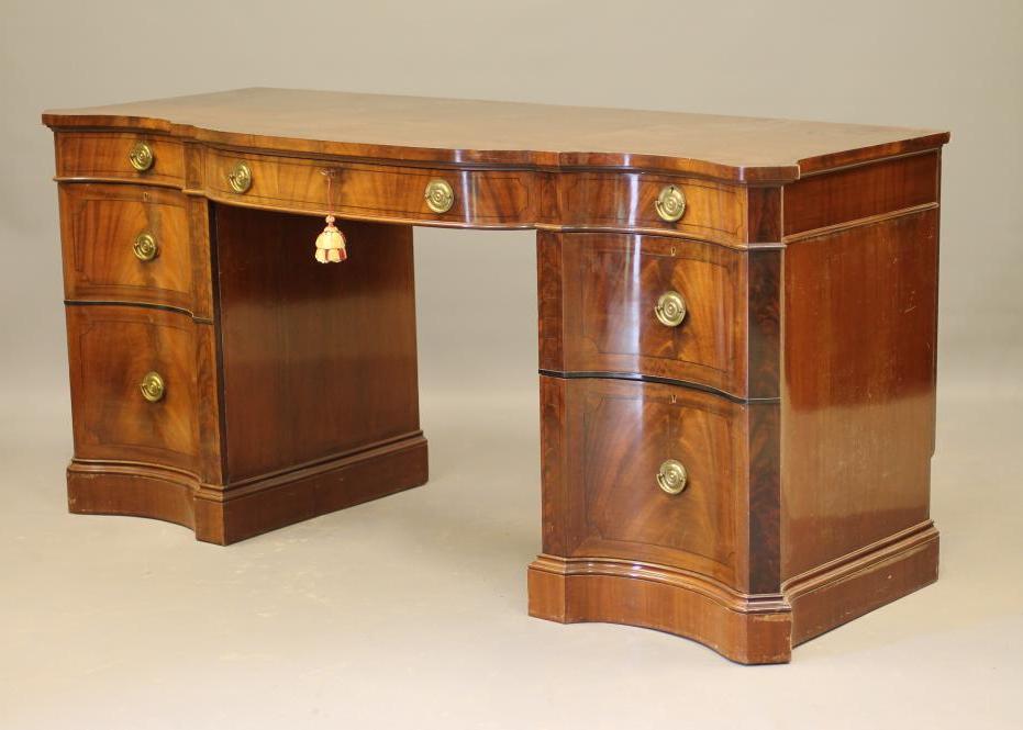 A MAHOGANY PEDESTAL SIDEBOARD Image
