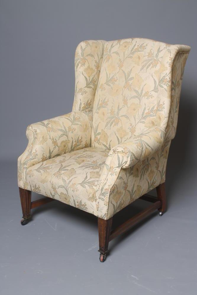 AN OAK FRAMED WING ARMCHAIR of Georgian design Image