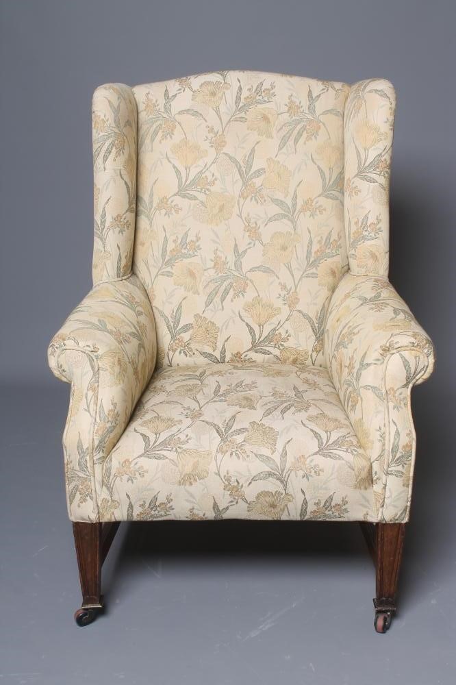 AN OAK FRAMED WING ARMCHAIR of Georgian design Image