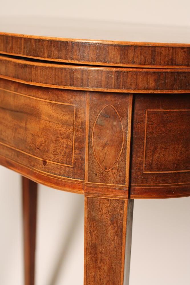 A GEORGIAN MAHOGANY FOLDING TEA TABLE Image