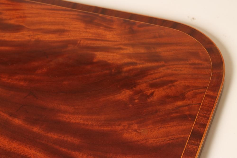 A GEORGIAN MAHOGANY FOLDING TEA TABLE Image