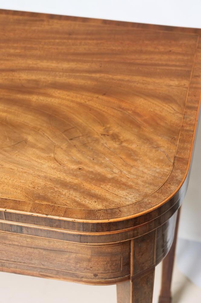 A GEORGIAN MAHOGANY FOLDING TEA TABLE Image