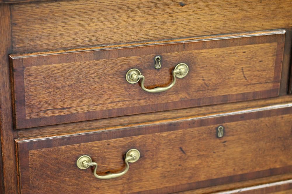 A GEORGIAN OAK AND MAHOGANY BANDED LANCASHIRE DRESSER Image