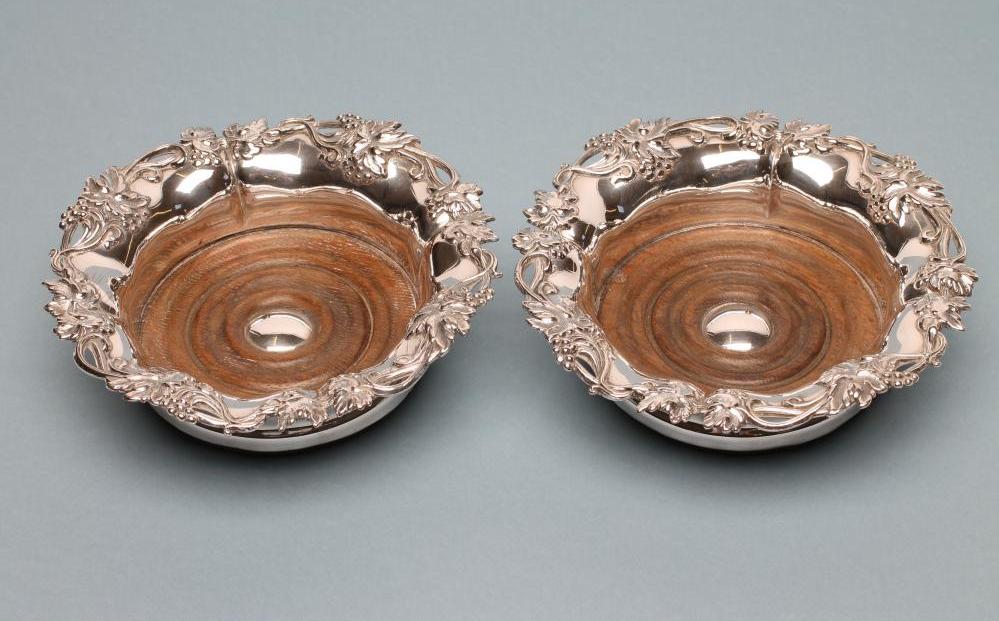 A PAIR OF OLD SHEFFIELD PLATE BOTTLE COASTERS of lobed circular form Image