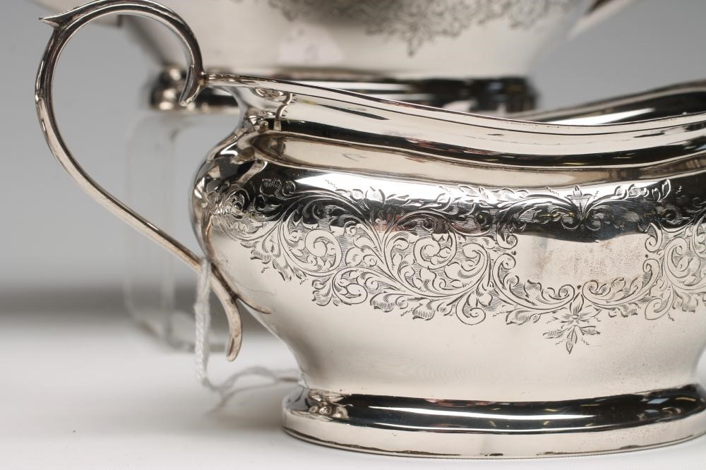 *A COMPOSITE FOUR PIECE SILVER TEA AND COFFEE SERVICE Image