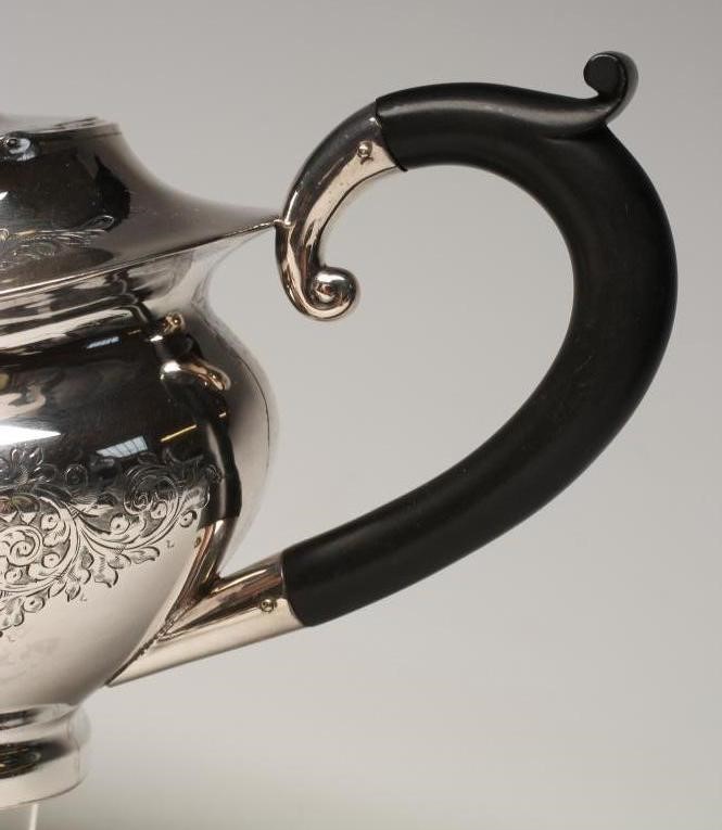 *A COMPOSITE FOUR PIECE SILVER TEA AND COFFEE SERVICE Image