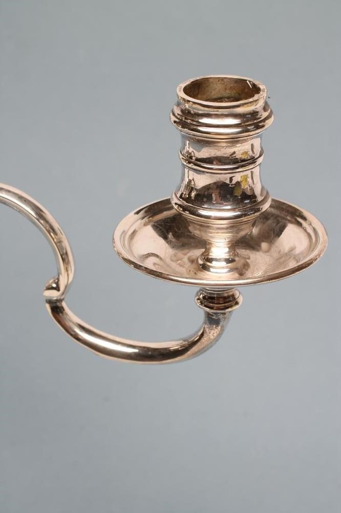 A GEORGE I STYLE SILVER THREE BRANCH CANDELABRUM Image