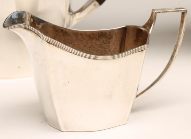 *AN ART DECO FOUR PIECE SILVER TEA AND COFFEE SERVICE Image