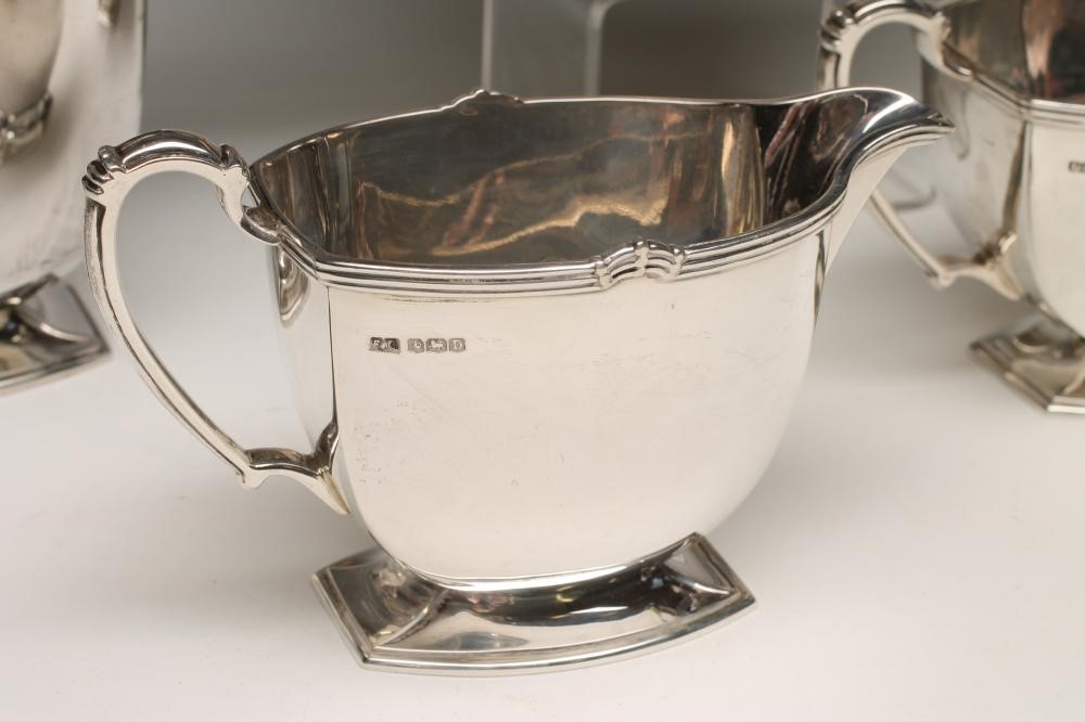 AN ART DECO FOUR PIECE SILVER TEA AND COFFEE SERVICE Image