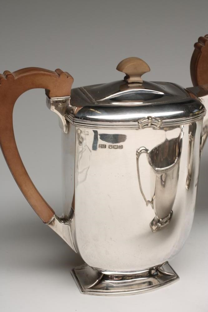AN ART DECO FOUR PIECE SILVER TEA AND COFFEE SERVICE Image