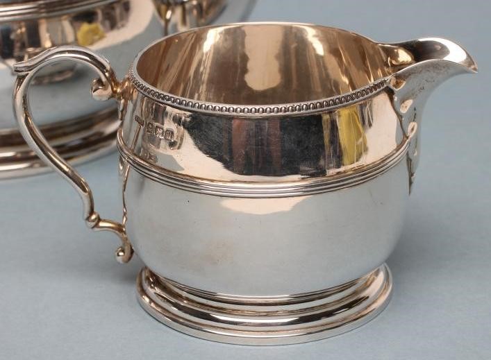 A THREE PIECE SILVER TEA SERVICE Image