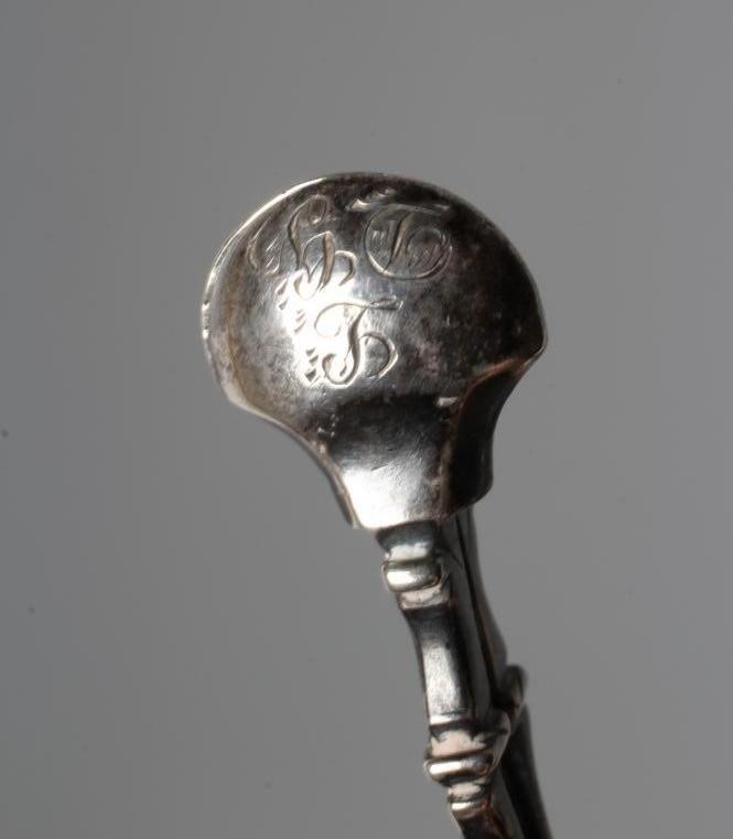 A PAIR OF GEORGE II SILVER SCISSOR SUGAR NIPS, by William Dorrell, no date letter c.1745, the plain Image