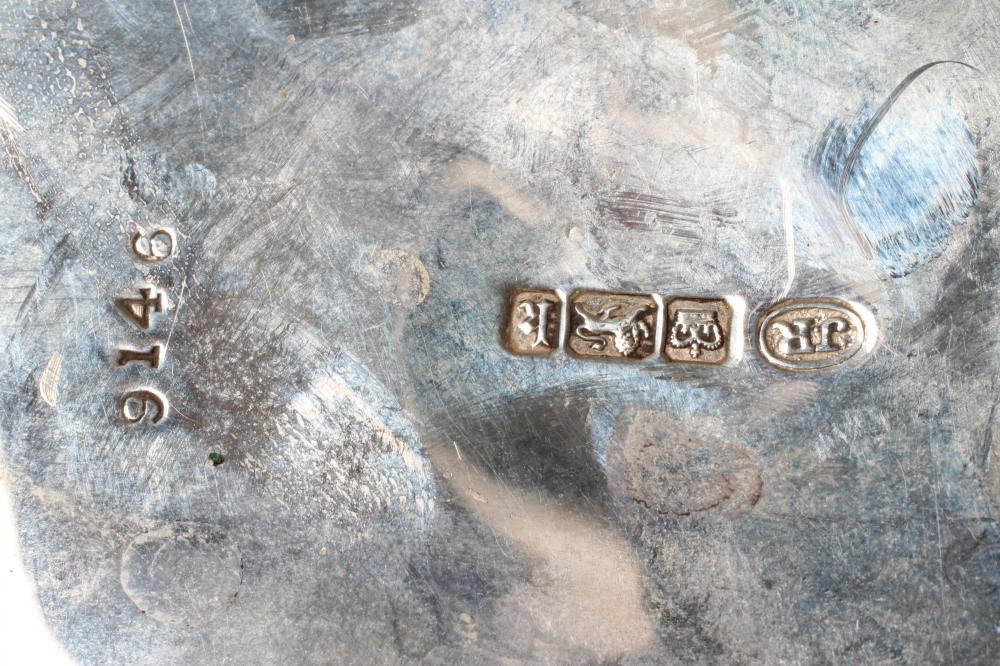AN EDWARDIAN SILVER FOUR PIECE TEA AND COFFEE SERVICE Image