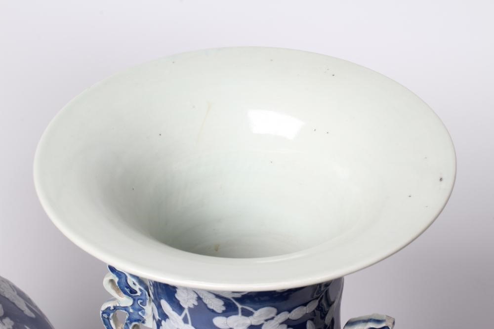 A LARGE PAIR OF CHINESE PORCELAIN VASES of inverted baluster form with two open lug handles Image