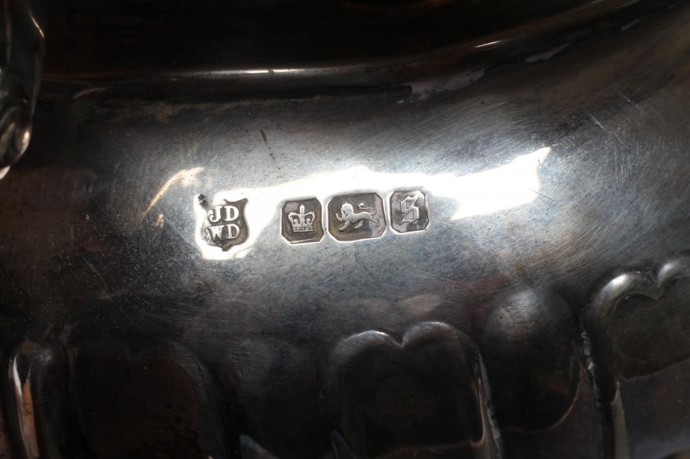 AN EDWARDIAN SILVER THREE PIECE TEA SERVICE Image