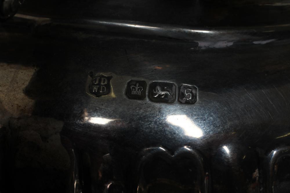 AN EDWARDIAN SILVER THREE PIECE TEA SERVICE Image