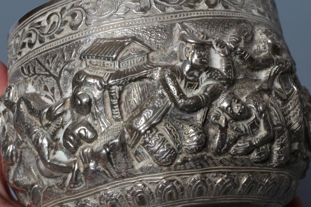 A BURMESE WHITE METAL BOWL of rounded cylindrical form Image
