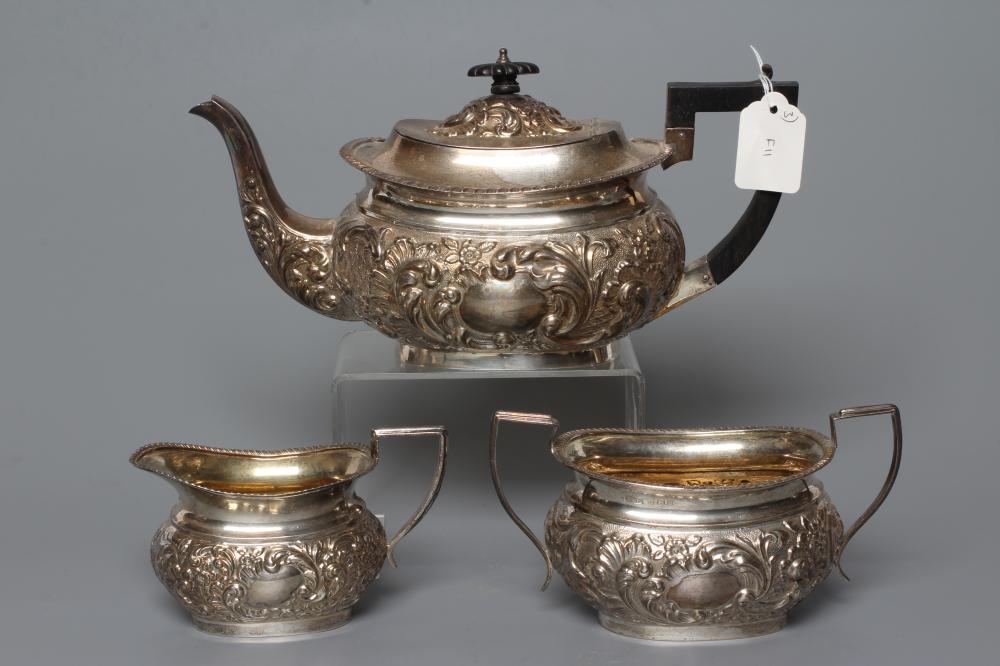 A COMPOSITE THREE PIECE SILVER TEA SERVICE Image