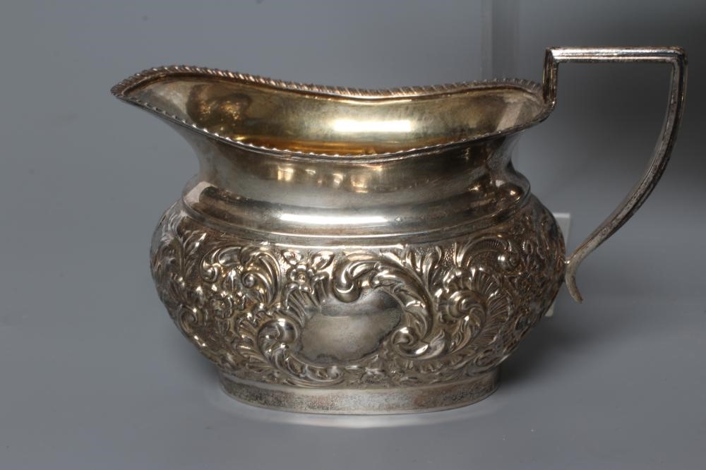 A COMPOSITE THREE PIECE SILVER TEA SERVICE Image