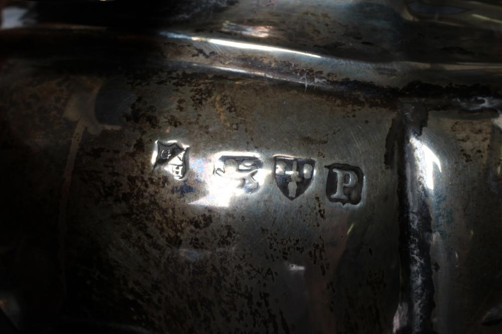 A LATE VICTORIAN THREE PIECE BACHELOR'S SILVER TEA SERVICE Image