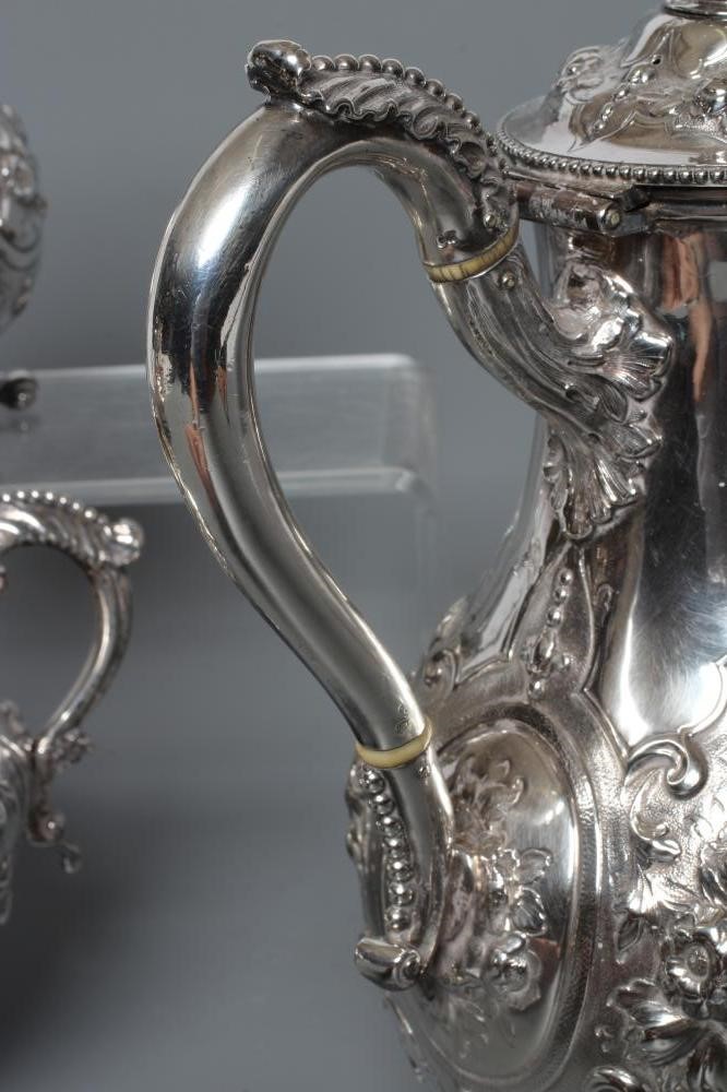 A MID VICTORIAN SILVER FOUR PIECE TEA AND COFFEE SERVICE Image
