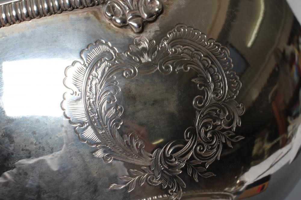 A LATE VICTORIAN SILVER SUGAR BASKET Image