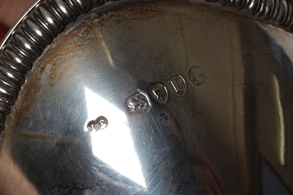 A LATE VICTORIAN SILVER SUGAR BASKET Image