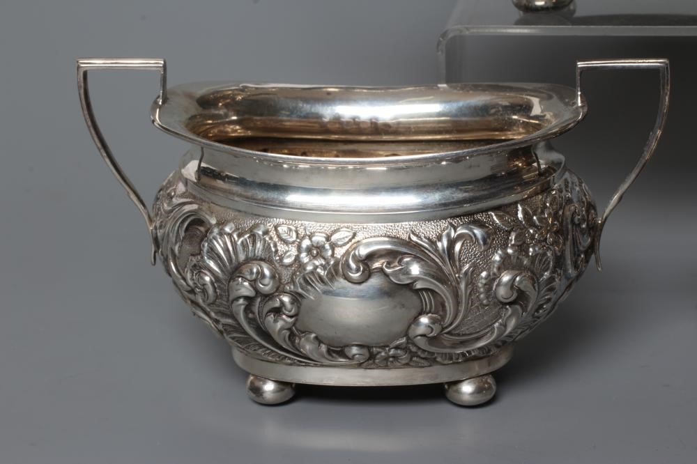 A LATE VICTORIAN SILVER THREE PIECE TEA SERVICE Image
