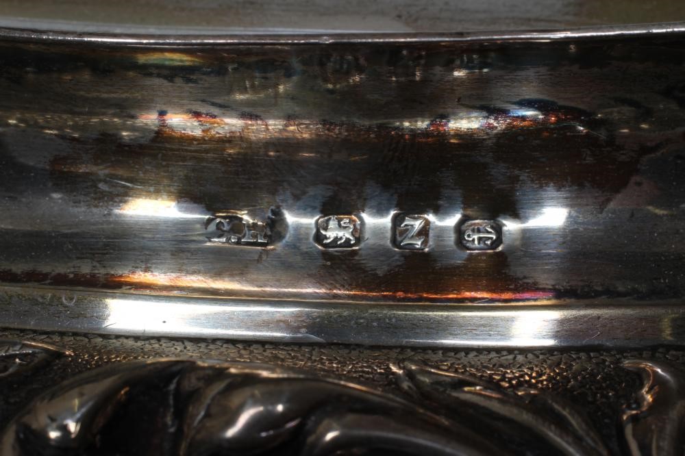 A LATE VICTORIAN SILVER THREE PIECE TEA SERVICE Image