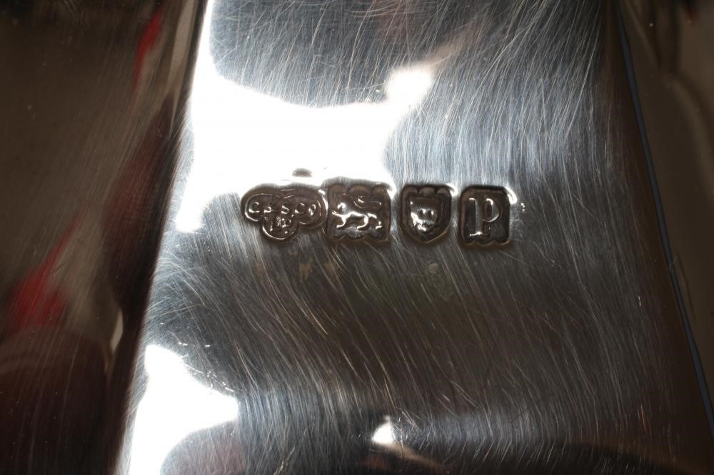 AN EDWARDIAN SILVER THREE PIECE TEA SERVICE Image