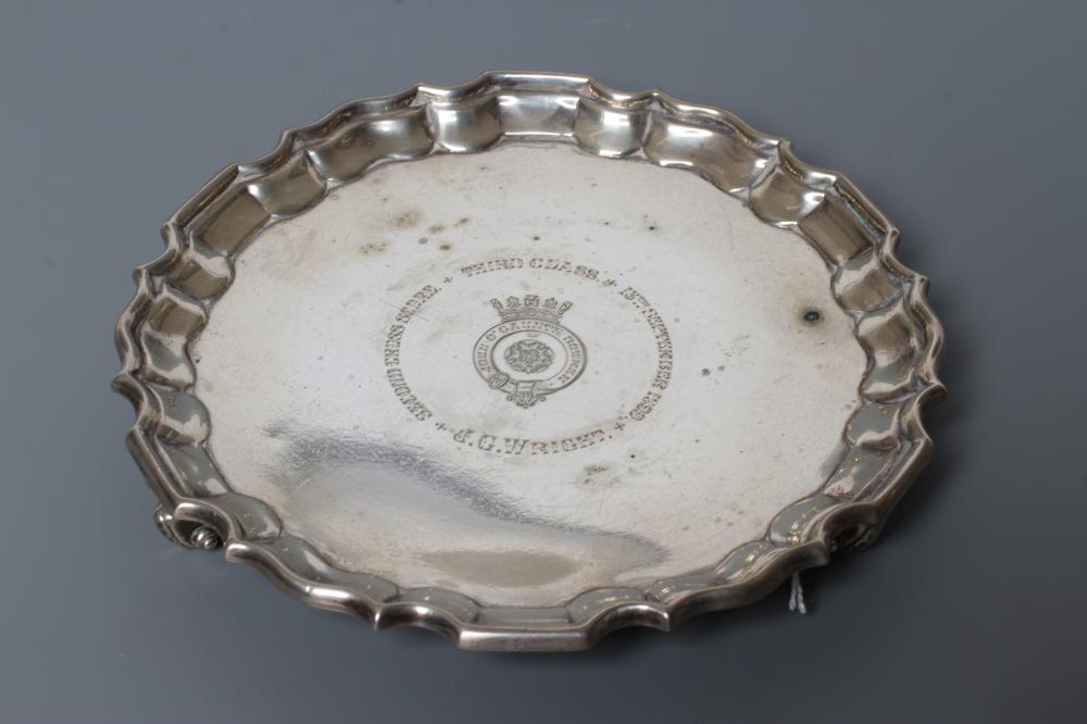 A LATE VICTORIAN SILVER WAITER Image