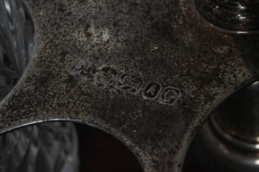 A VICTORIAN SILVER SEVEN BOTTLE CRUET AND OVAL STAND Image