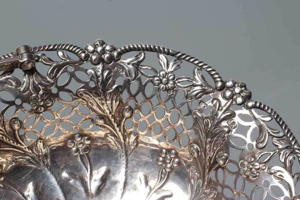 A GEORGE III SILVER EPERGNE BASKET Image