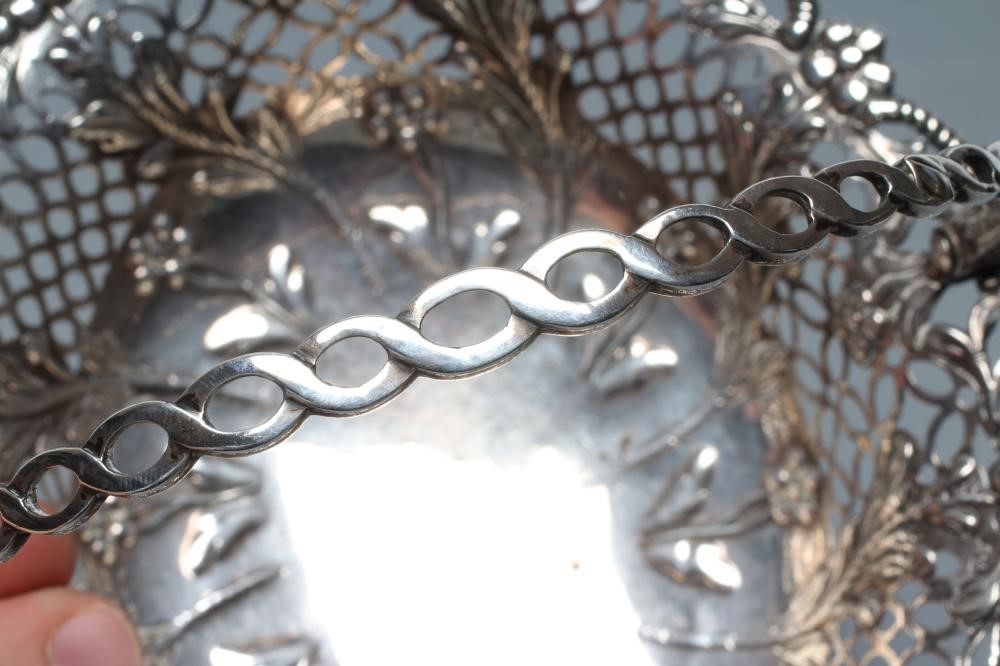 A GEORGE III SILVER EPERGNE BASKET Image