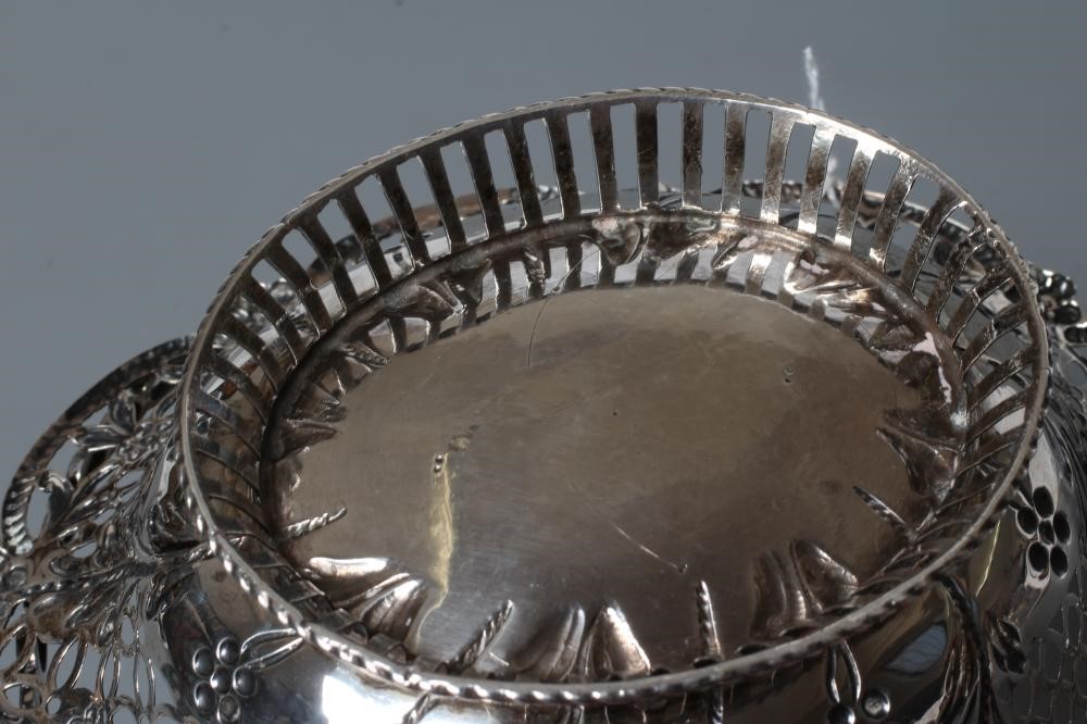 A GEORGE III SILVER EPERGNE BASKET Image