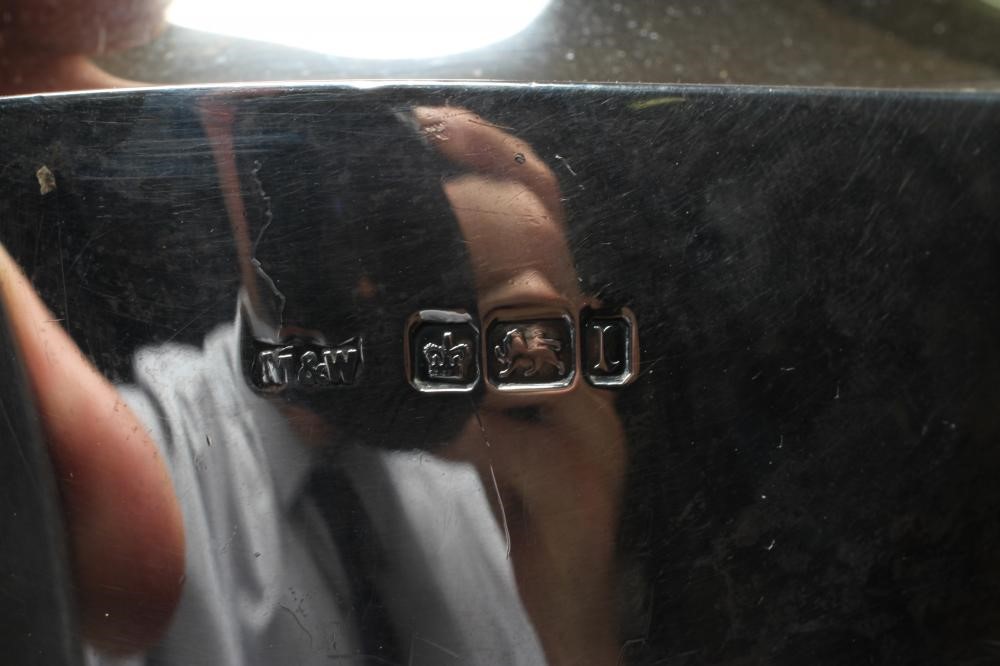 AN EDWARDIAN SILVER THREE PIECE TEA SERVICE Image