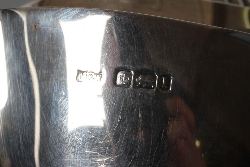 AN EDWARDIAN SILVER THREE PIECE TEA SERVICE Image