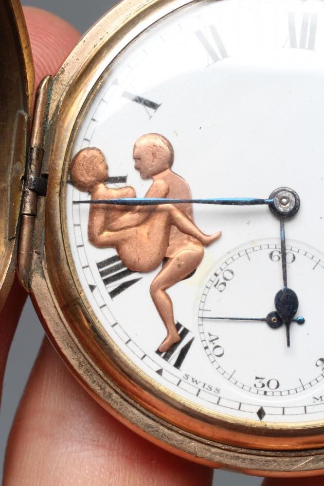 AN EDWARDIAN GOLD PLATED TOP WIND EROTIC AUTOMATON HUNTER POCKET WATCH Image