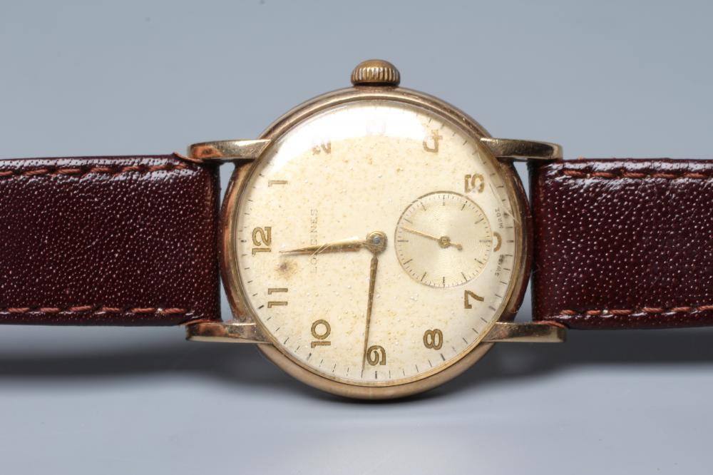 A GENTLEMAN'S 9CT GOLD LONGINES WRISTWATCH Image