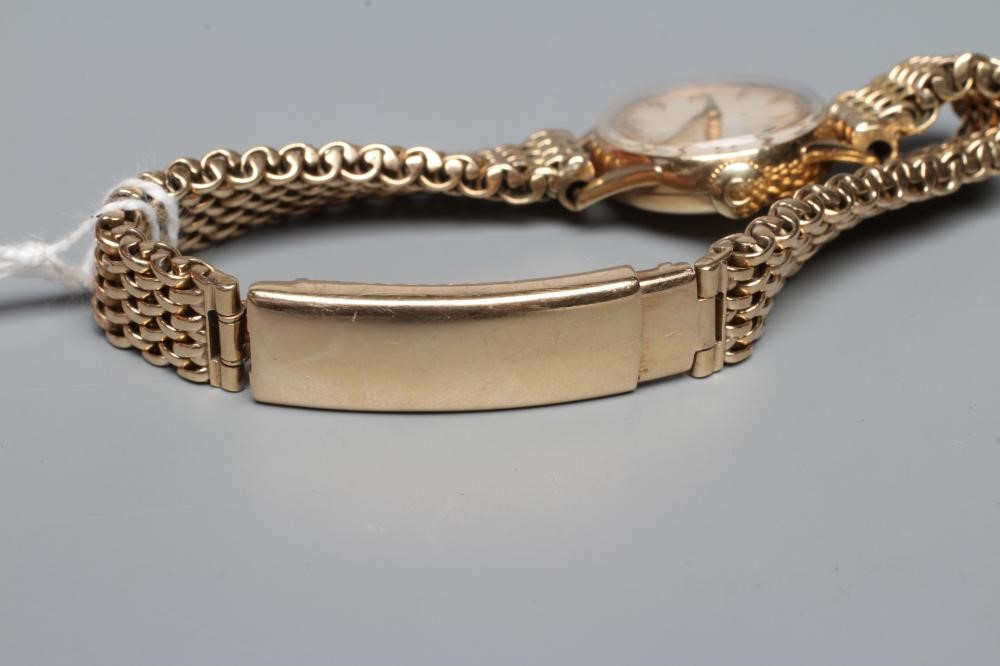 A LADY'S 9CT GOLD OMEGA WRISTWATCH Image