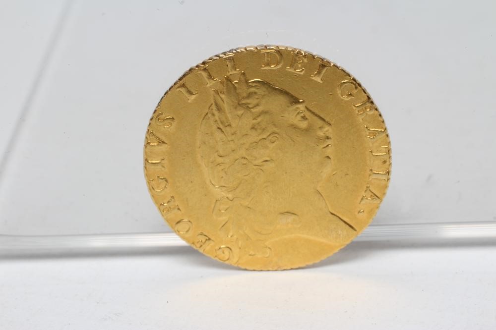 A GEORGE III GOLD GUINEA, 1792, 8.3g (Est. plus 20% premium) Image