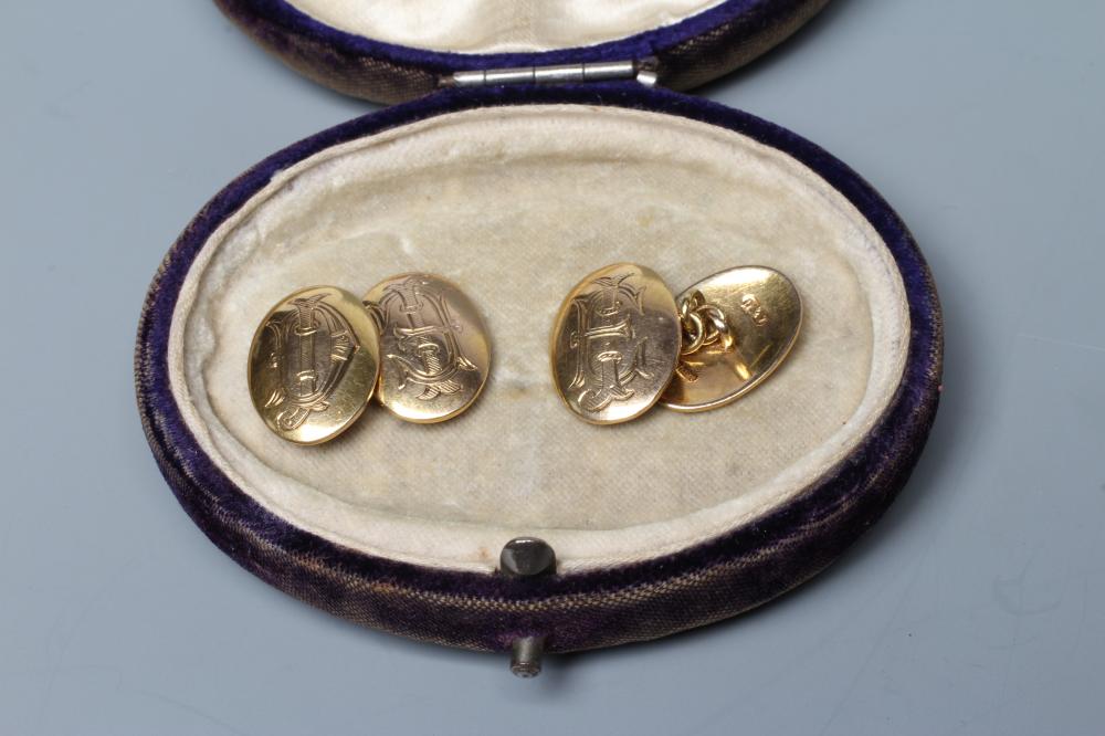 A PAIR OF 9CT GOLD CUFFLINKS of domed oval form engraved with a monogram, stamped 375, 9, sponsor Image