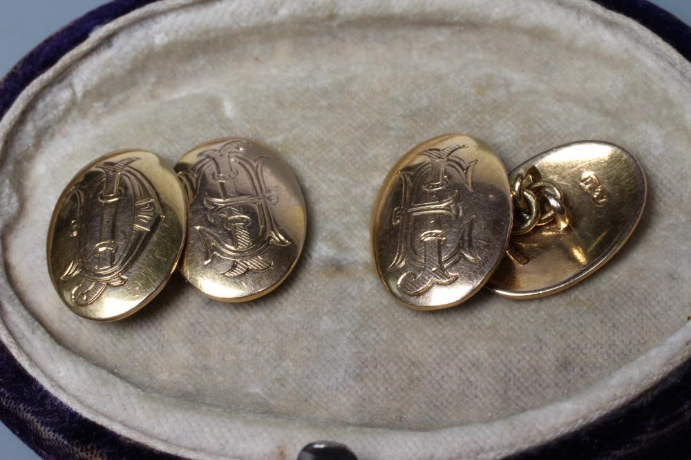 A PAIR OF 9CT GOLD CUFFLINKS of domed oval form engraved with a monogram, stamped 375, 9, sponsor Image